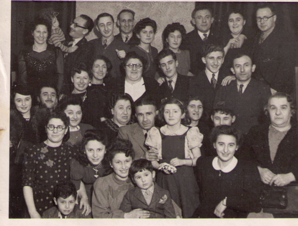 This photograph was taken in 1943 on the occasion of Trevor Glass’s bar mitzvah. You can see several Bookbinders and Mendzigurskys. Peisech is on the right of the middle row, behind the lady with the handbag, who is Sarah Bookbinder Bowman. Leiser Chil Mendizgurski is standing on the top row, third from the right